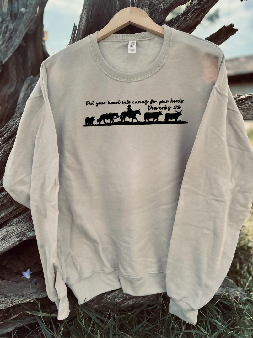 sandstone sweatshirt with a design on a wooden background