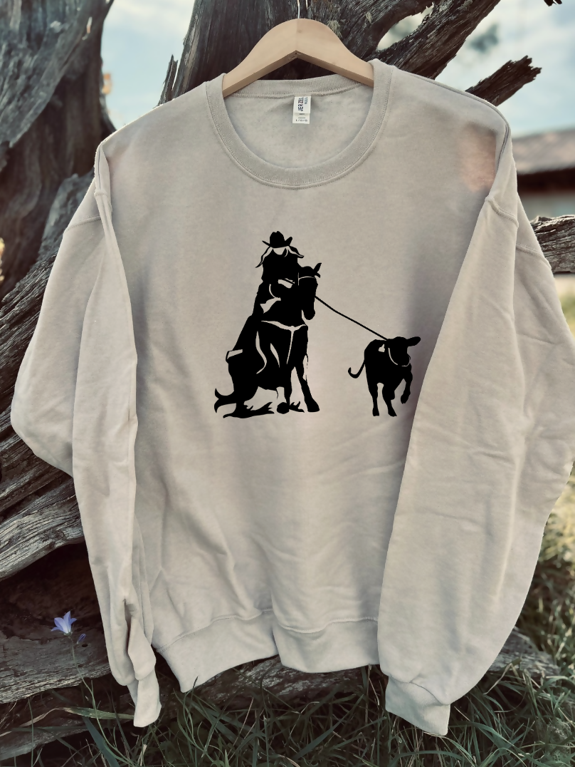 sandstone sweatshirt with a design on a wooden background
