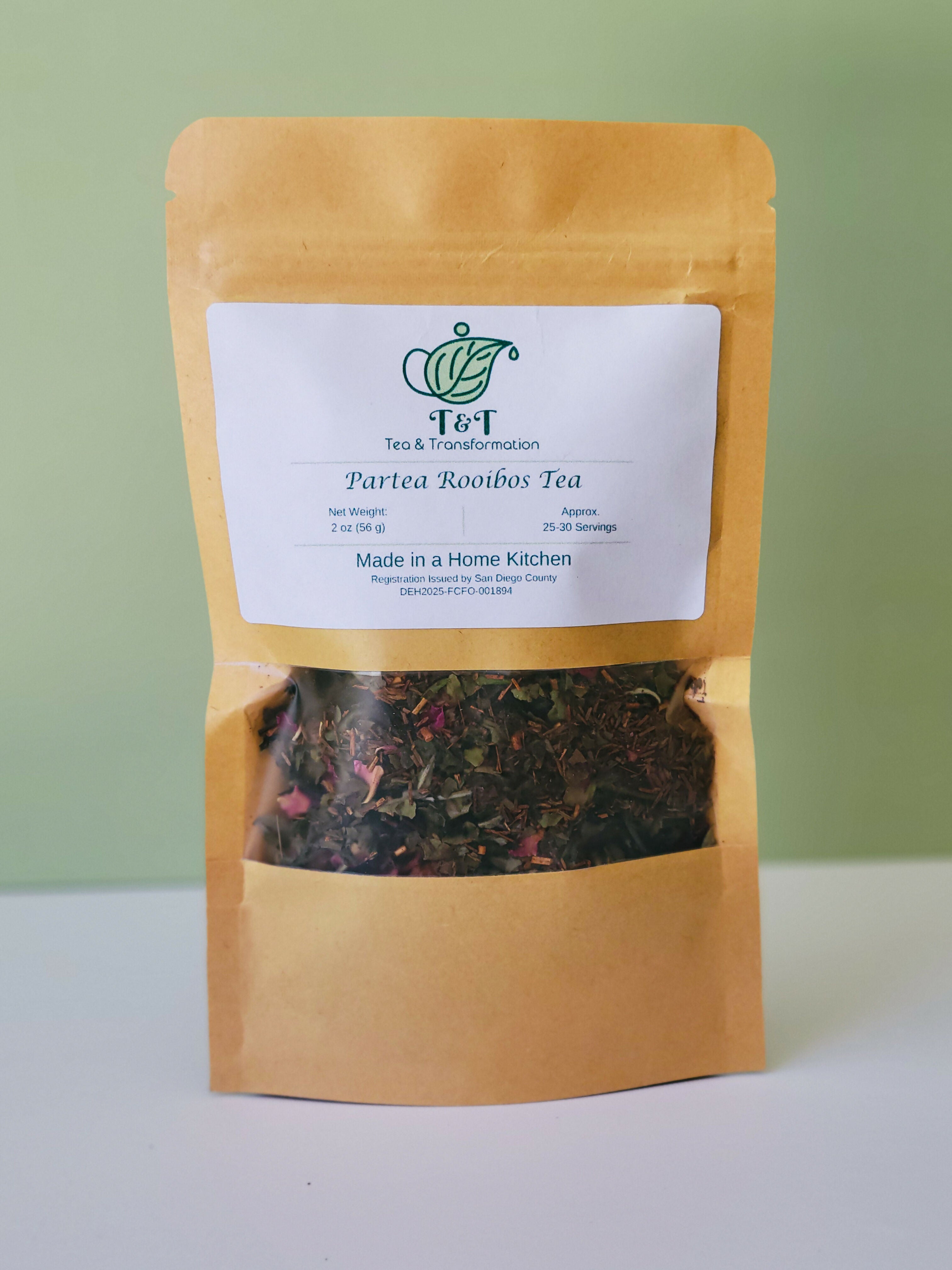Partea Roobios Tea in tea bag with white & green background