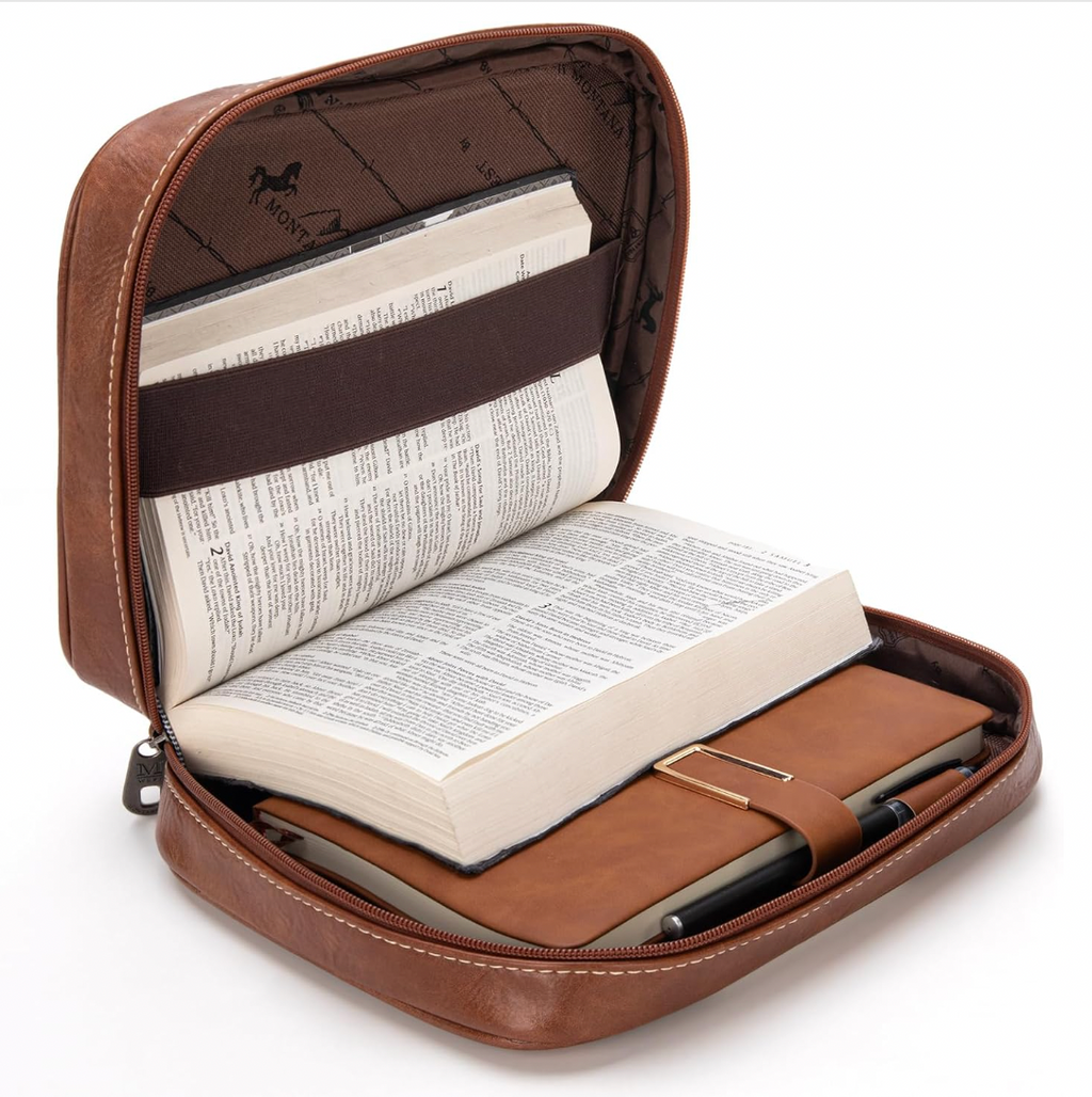 Brown leather case with an open book inside on a white background