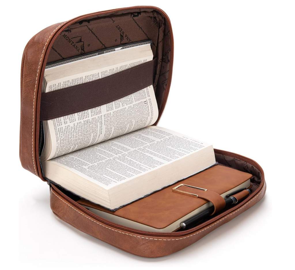 Brown leather case with an open book inside on a white background