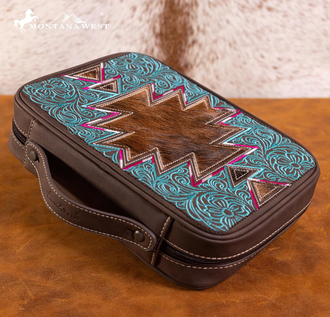 Brown leather case with intricate patterns on a wooden surface, featuring the Montana West brand.