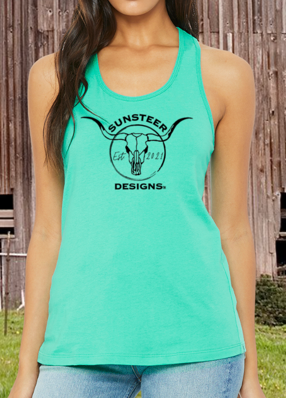 Person wearing a teal tank top with 'Sunsteer Designs' logo against a wooden fence background