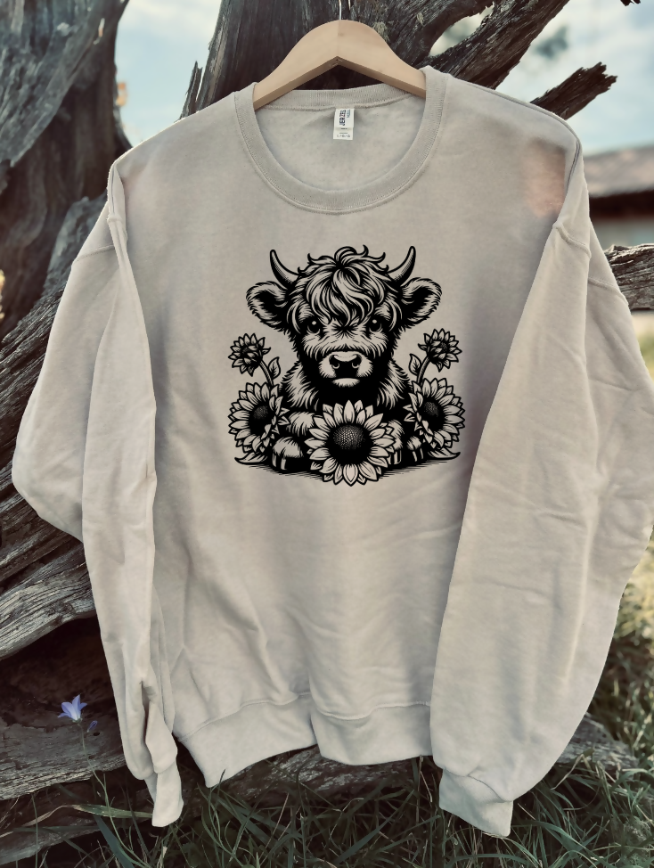 sandstone sweatshirt with a design on a wooden background